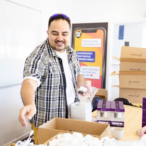 Pays for a box of safe phones to be sent to an agency partner